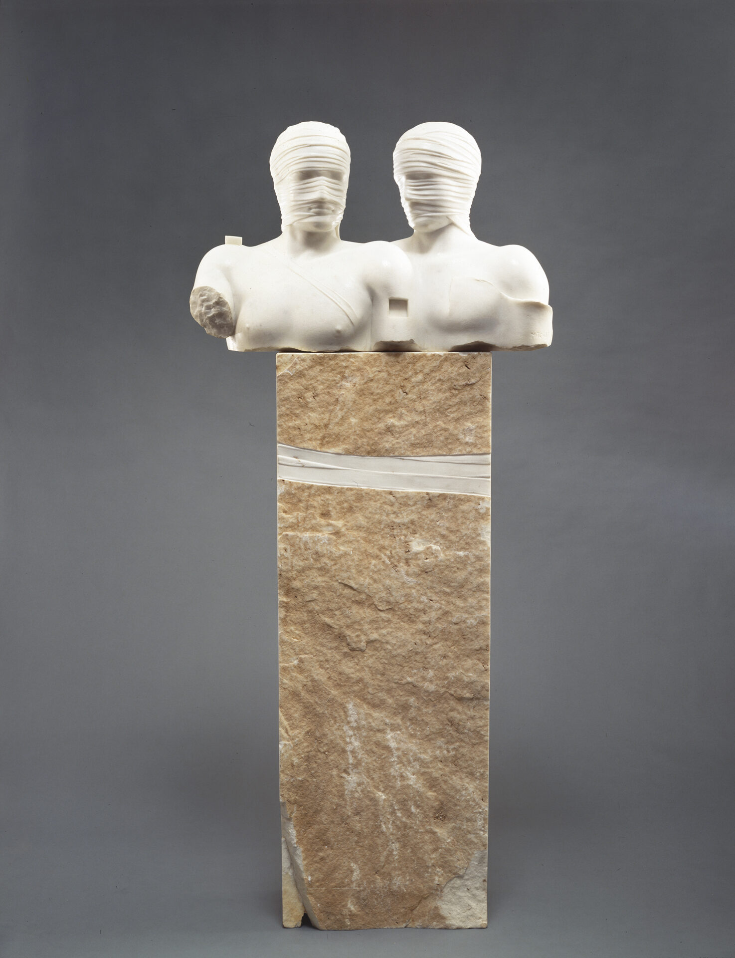 Sculpture Photo of Two Busts on a Pillar